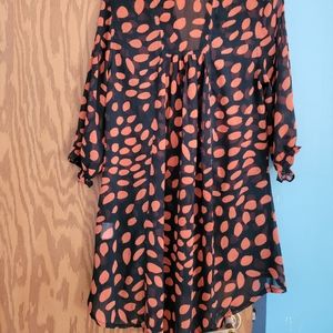 Orange and black top